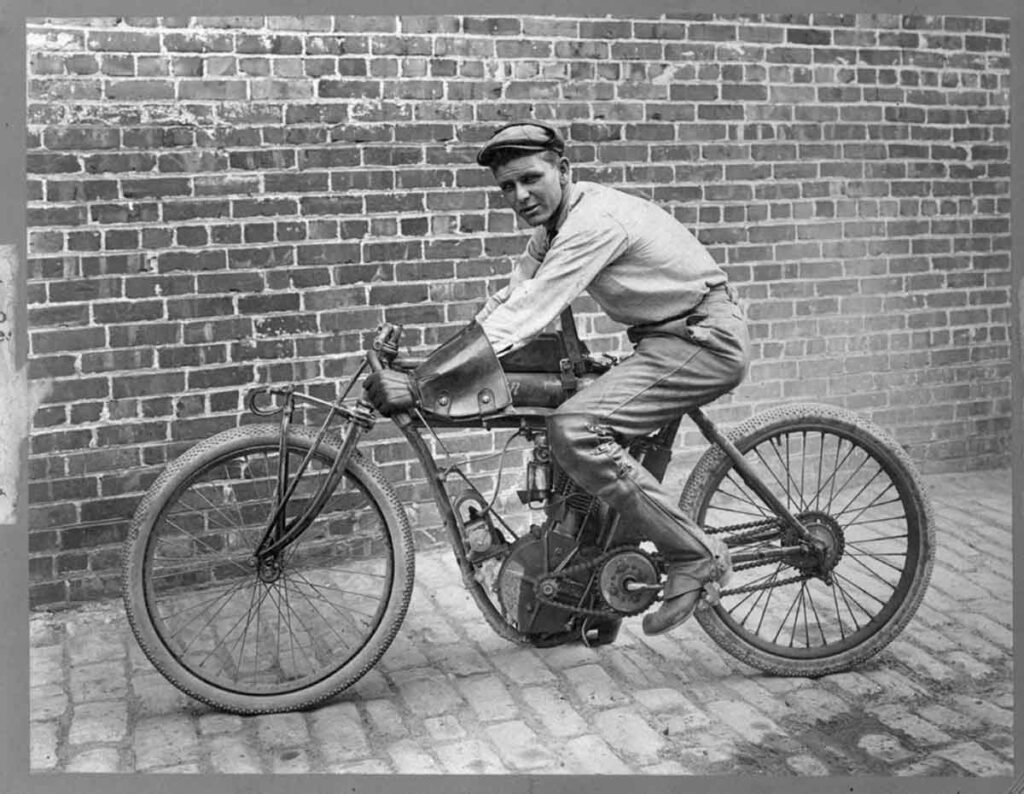 A young Wells Bennett on an Indian motorcycle.